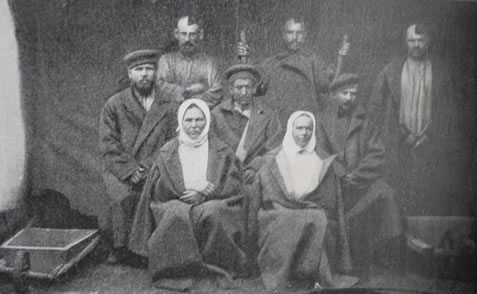 Sakhalin convicts (note the men chained to the wheelbarrows)
